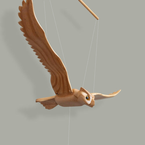 Carved Pine Owl Mobile in flight